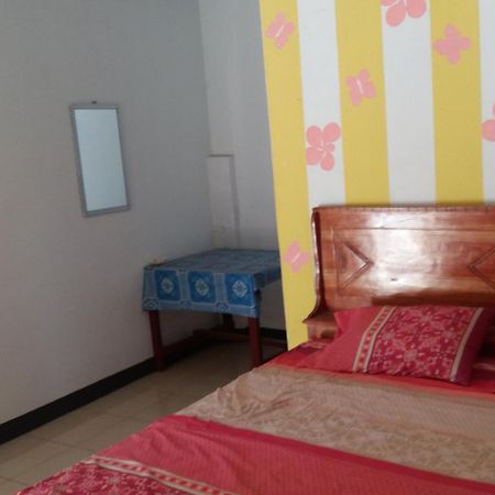 Ekas Beach Guesthouse Mitra Reddoorz Kamer foto
