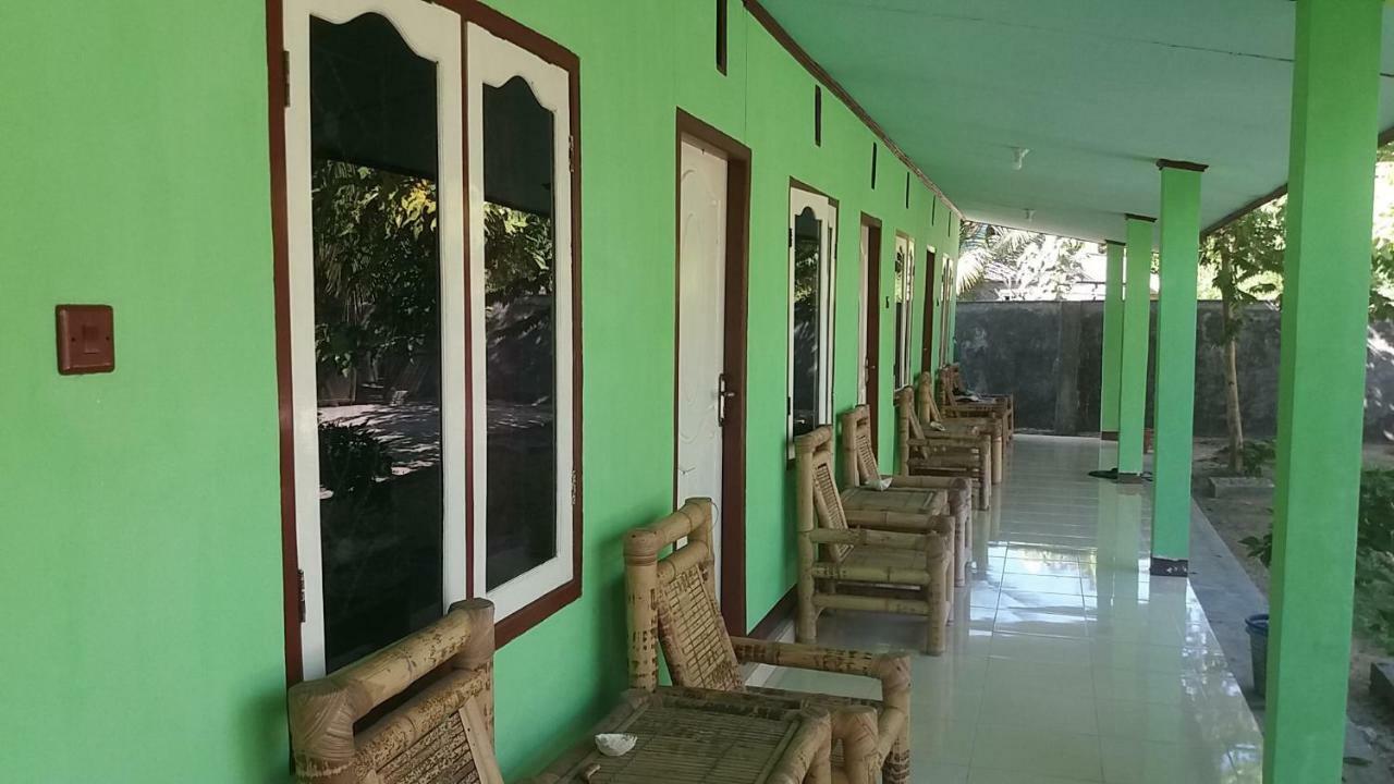 Ekas Beach Guesthouse Mitra Reddoorz Buitenkant foto